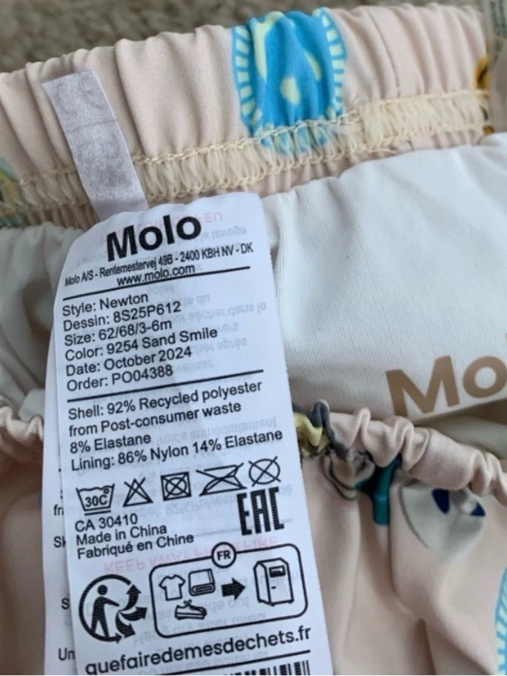 Molo Beige Swimsuit with Orange, Blue and Green Accents